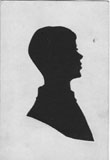 A silhouette cut out of me (Daniel) done at a garden party.