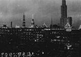 Shanghai at night. The tall building is the Wing On department store.