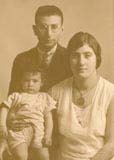 My father, Reuben Moalem, and mother, Girgee Ghazal, with me (Dan) at one and a half years of age. (1932)